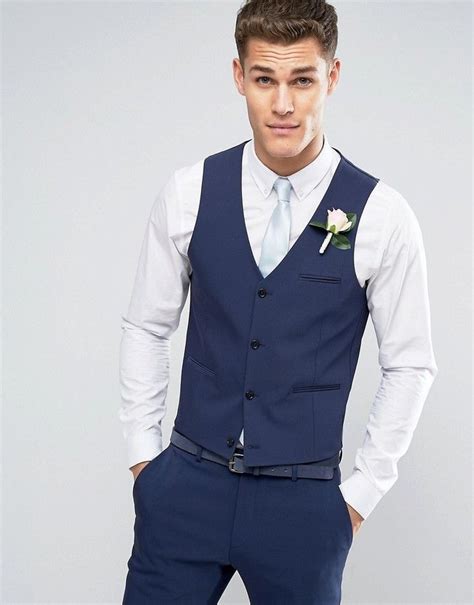 navy blue vest with black pants